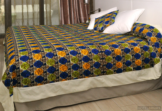 Funda nórdica combinada de tela africana Wax y tela lisa de algodón 100% y dos almohadas a juego con tela lisa.